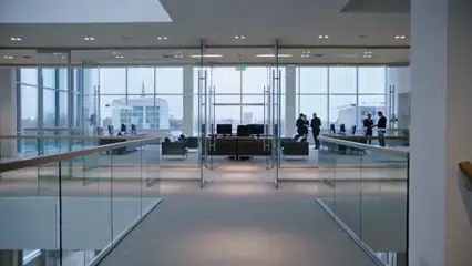 A bright glass office atrium